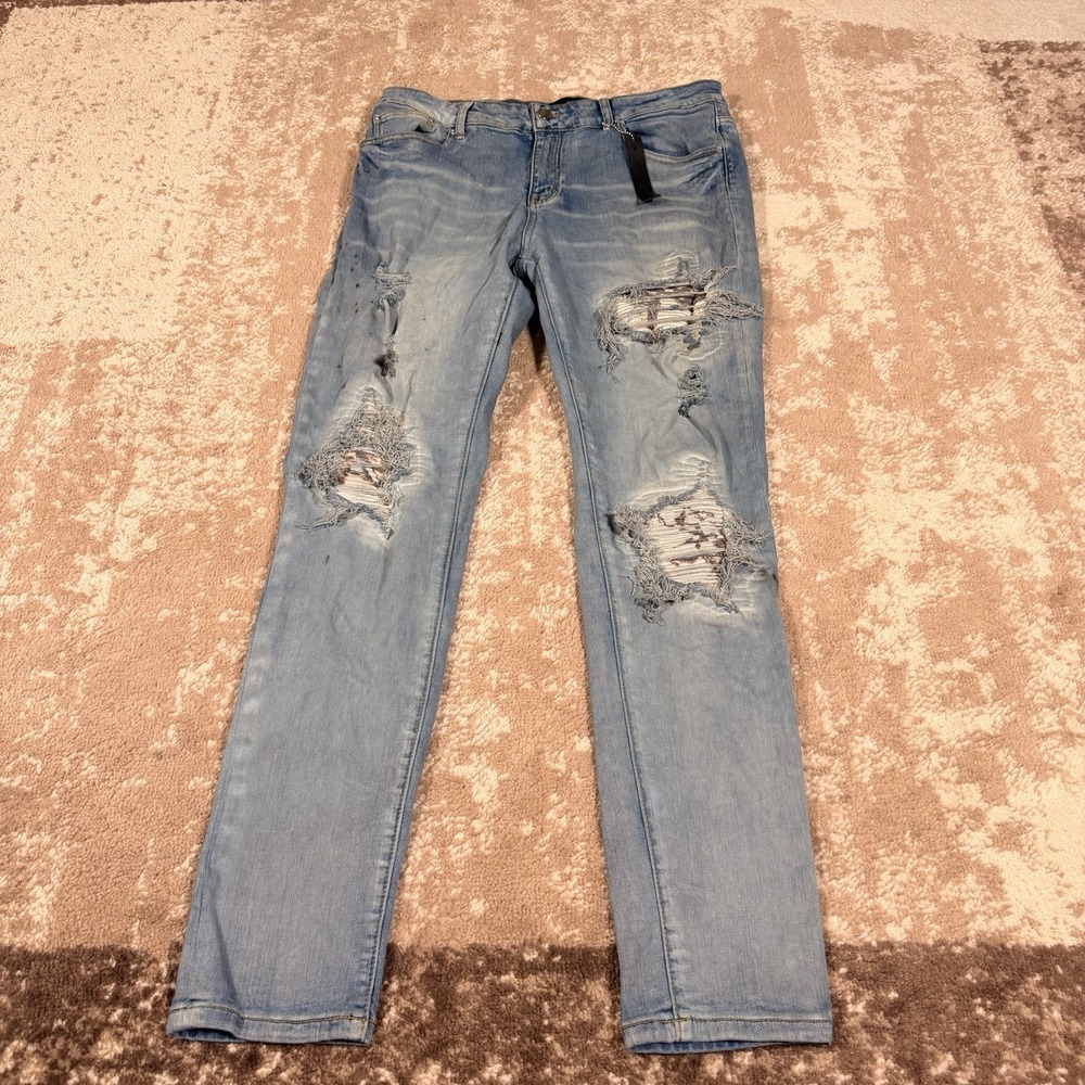 AMIRI Light Blue Denim Distressed Patterned Patch Slim Fit Men's 34x33